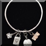 J068. Jes MaHarry silver bangle bracelet with charms. - $150